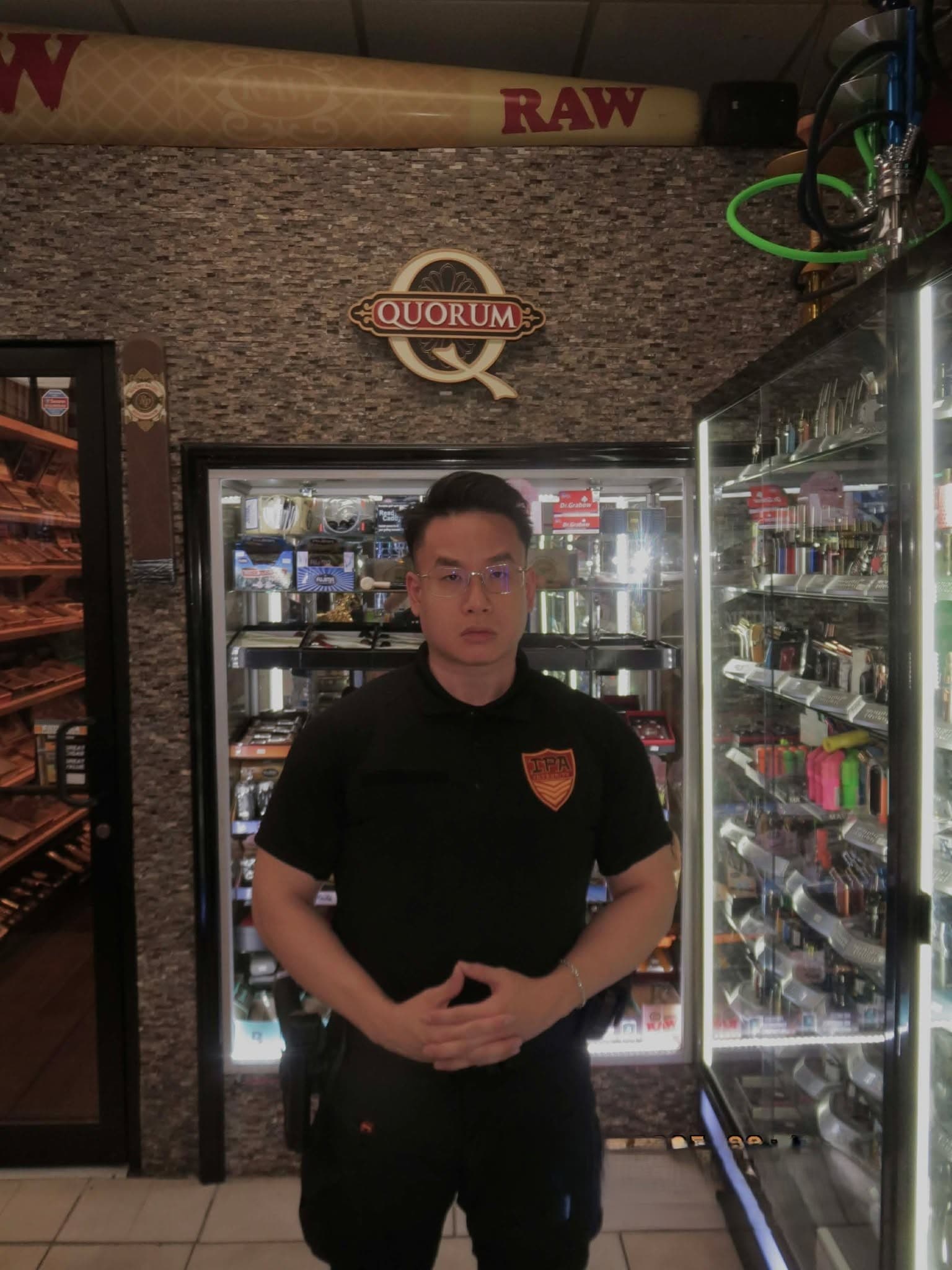 Tommy Le, COO of Integrity Protection Agency, on duty at a Minneapolis tobacco store